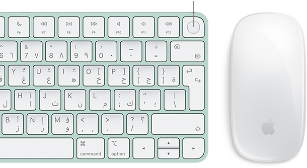 لقطة علوية مقربة للوحة مفاتيح ماجيك مع ميزة بصمة الاصبع وبجوارها ماجيك ماوس
