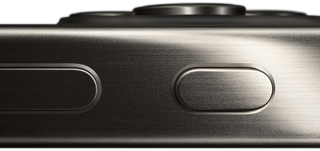 Side view of iPhone 15 Pro in a titanium design showing a volume button_river and Action button_river