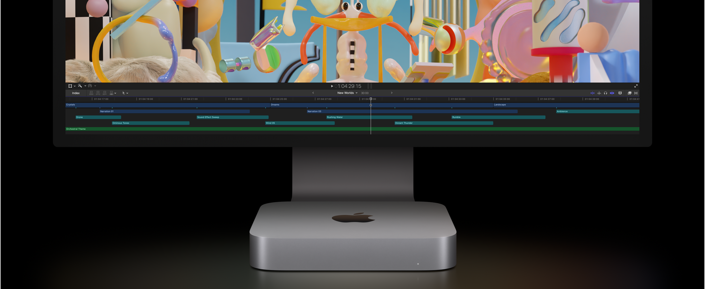 صورة أمامية لجهاز Mac mini وشاشة Studio Display تُظهر مشروع تعديل فيديو في Final Cut Pro.